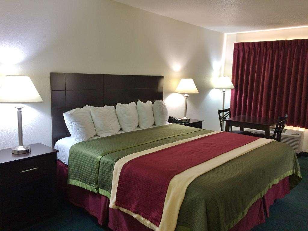 Travel Inn & Suites Atlanta Texas Oda fotoğraf